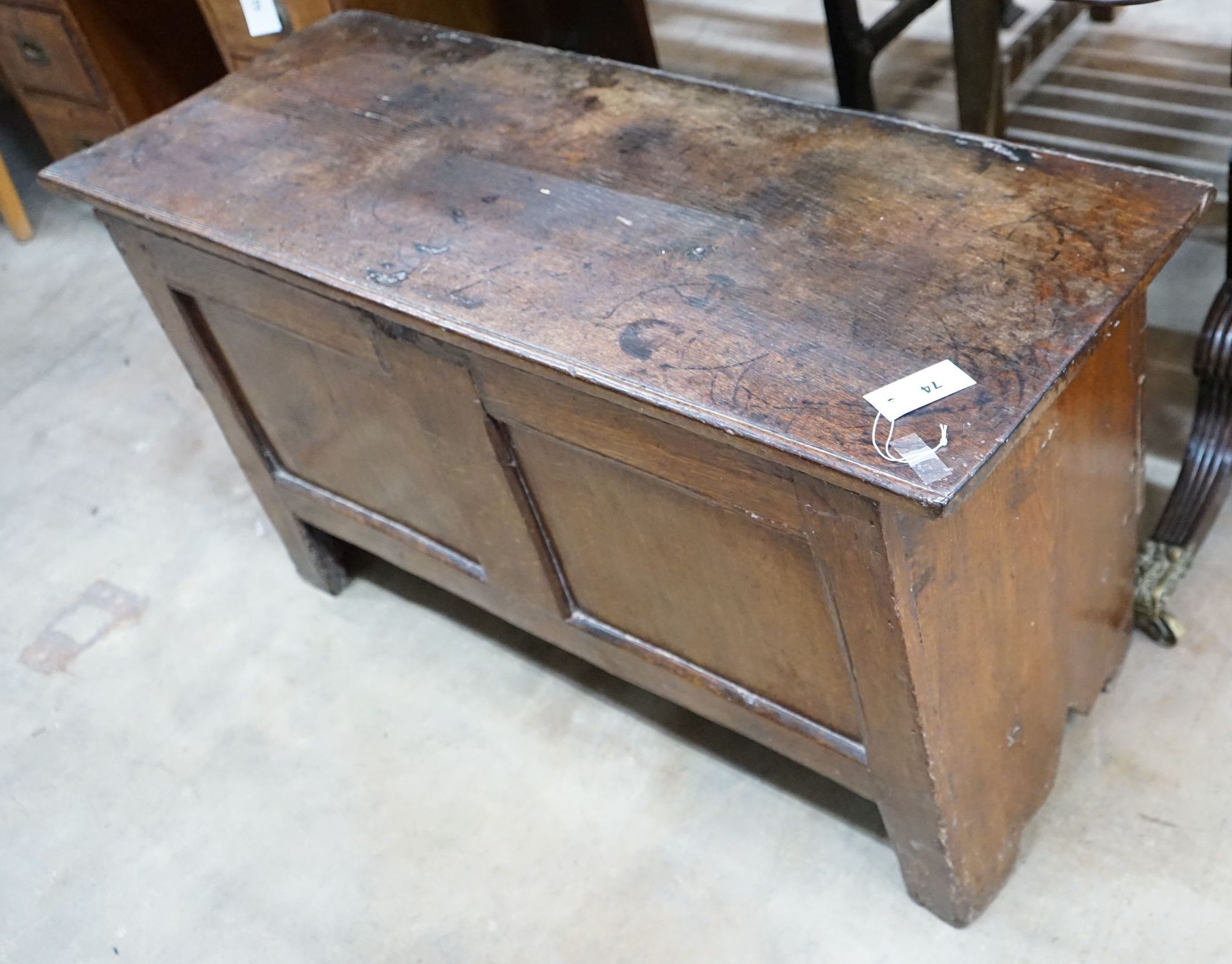 An 18th century panelled oak coffer, length 106cm, depth 42cm, height 59cm